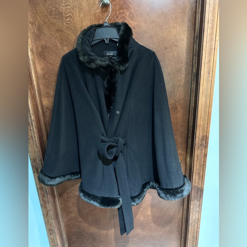 Winter coat but is worn like a cape